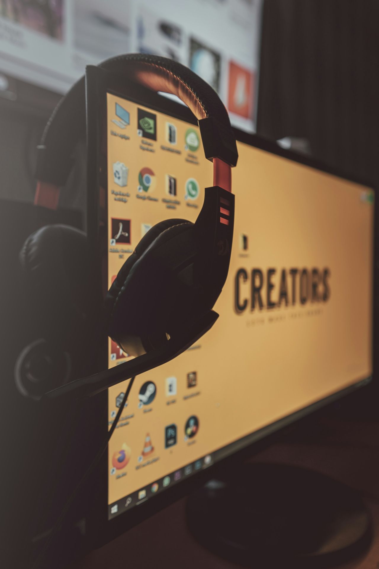 black and yellow corded headphones